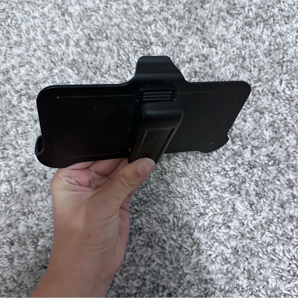 Black Otterbox clip on phone case